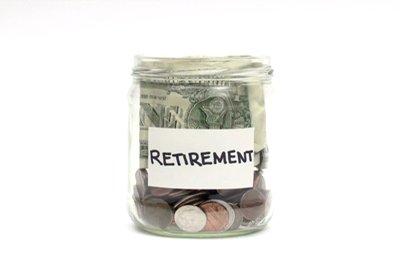 stock-footage-retirement-money-jar-adding-funds-ntsc