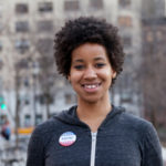 USA, New York, New York City, Portrait of woman with vote pin